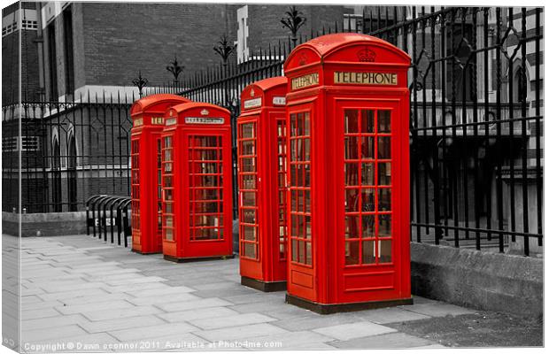 Red Telephone Boxes Canvas Print by Dawn O'Connor