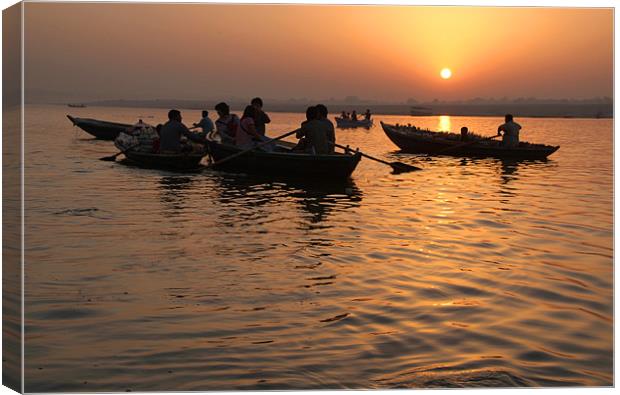 Tourists Enjoying Sunrise on the Ganges Canvas Print by Serena Bowles
