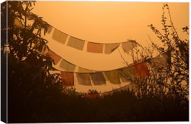 Prayer Flags and Mist Poon Hill Canvas Print by Serena Bowles