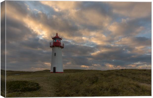 Dramatic sky over lighthouse Canvas Print by Thomas Schaeffer