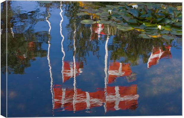 Flags in the mirror Canvas Print by Thomas Schaeffer