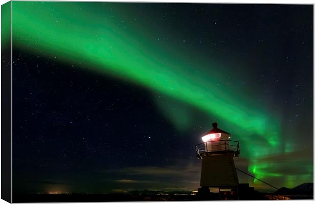 Aurora Borealis at the lighthouse Canvas Print by Thomas Schaeffer