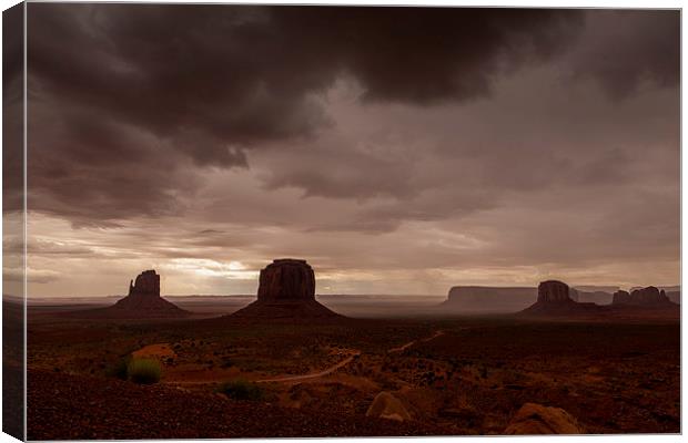 Monument Valley thunderstorm Canvas Print by Thomas Schaeffer