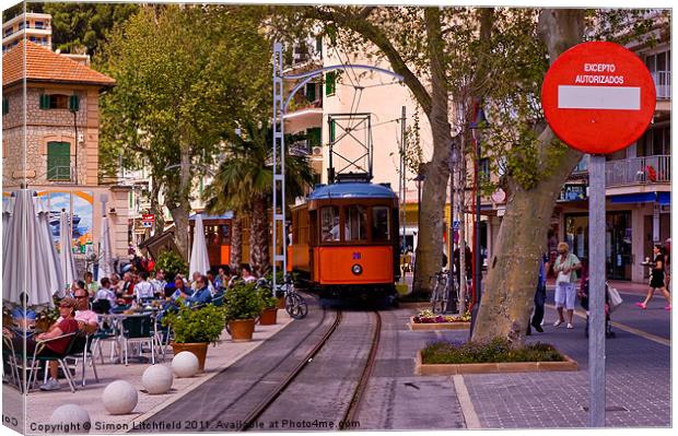 Port de Sóller Harbour Tram Canvas Print by Simon Litchfield