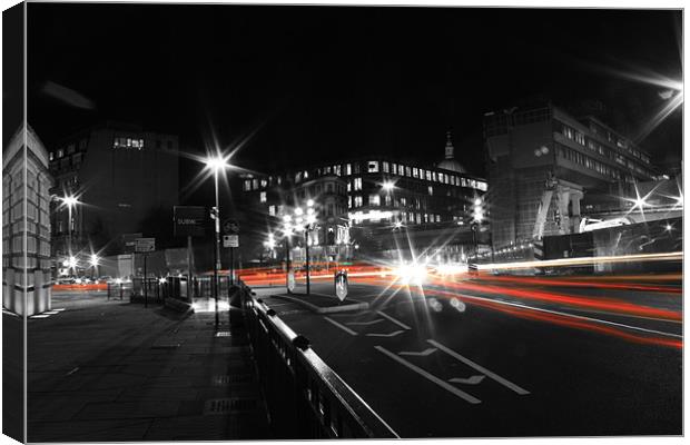 London busy road in trail of lights Canvas Print by Sarah Waddams