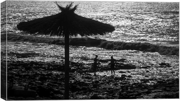 Beach Brolly Canvas Print by Geoff Storey