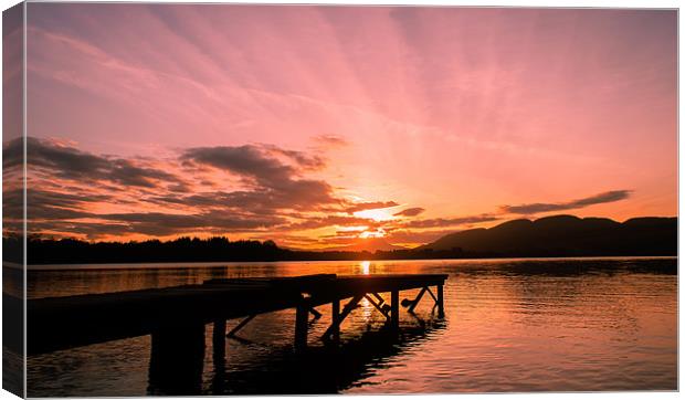 Sunset on the lake Canvas Print by Libby Hall