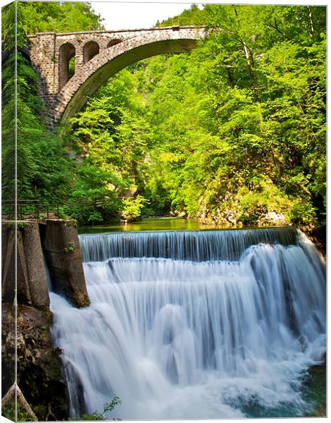Vintgar Gorge water and bridge, Slovenia Canvas Print by Kate Barley