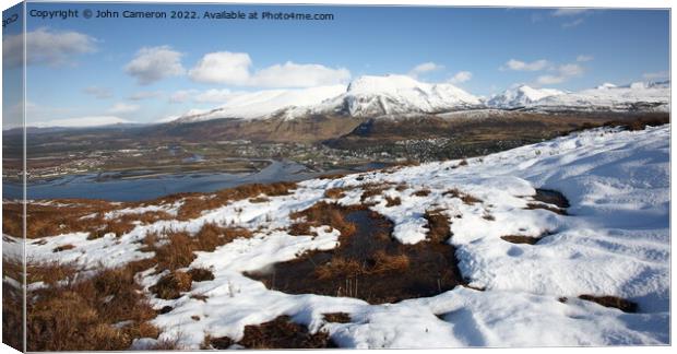 Ben Nevis & Fort William in March. Canvas Print by John Cameron