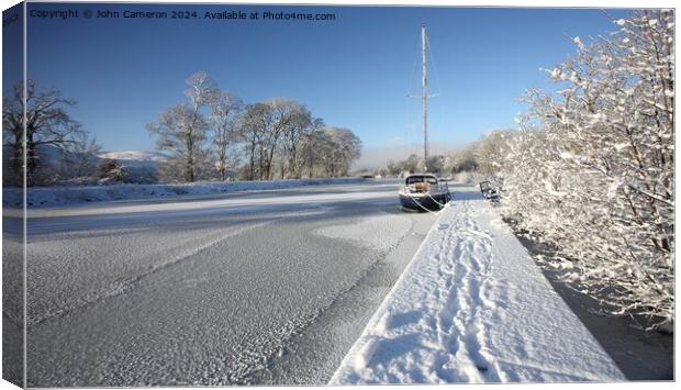 Caledonian Canal in winter. Canvas Print by John Cameron