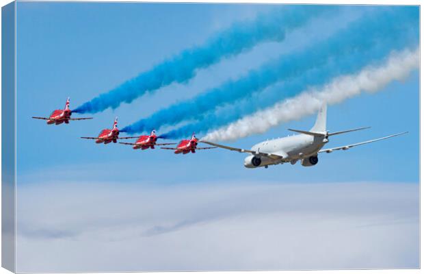 Red Arrows and P8 Poseidon Canvas Print by J Biggadike