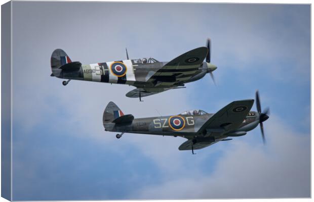 Spitfire AB910 and TE311 Canvas Print by J Biggadike