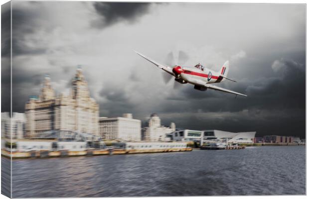 Spitfire over Liverpool Canvas Print by J Biggadike