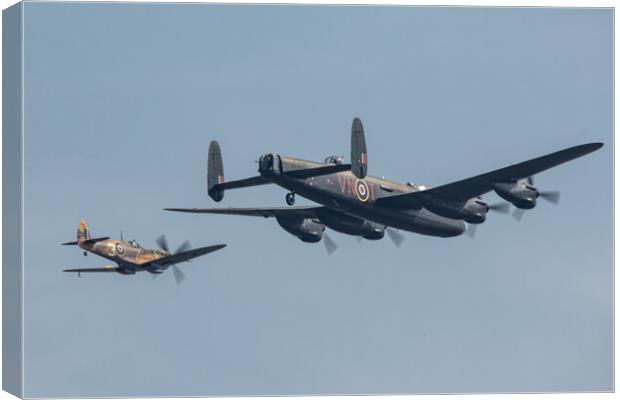 Lancaster Bomber with Spitfire MK356 Canvas Print by J Biggadike