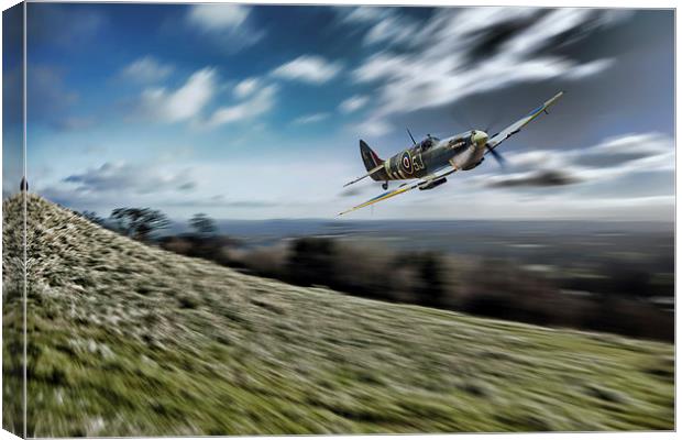 Supermarine Spitfire Fly Past Canvas Print by J Biggadike
