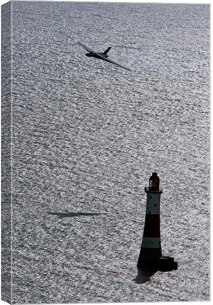 XH558 Over The Lighthouse Canvas Print by J Biggadike