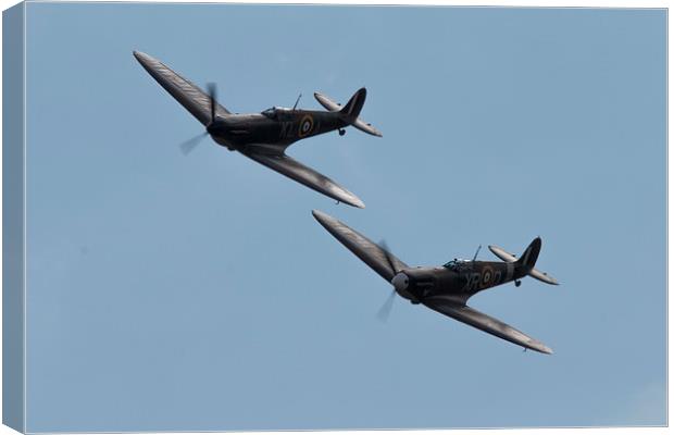 Here Come The Spitfires Canvas Print by J Biggadike