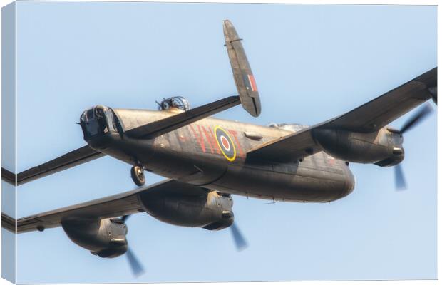 Golden Lancaster BOmber Canvas Print by J Biggadike