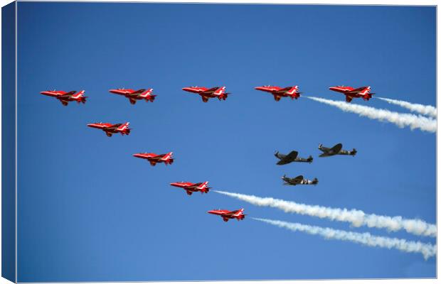 Red Arrows with the BBMF Spitfires Canvas Print by J Biggadike