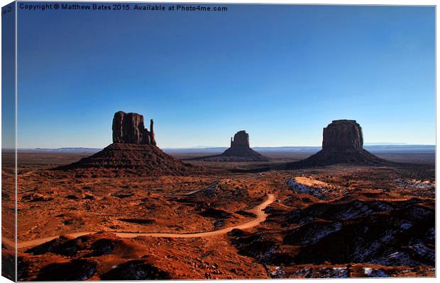  Monument Valley track Canvas Print by Matthew Bates