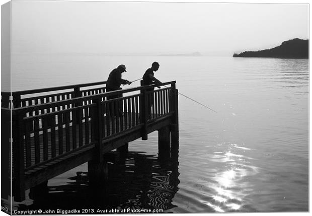 Fishing on Lake Garda Canvas Print by John Biggadike