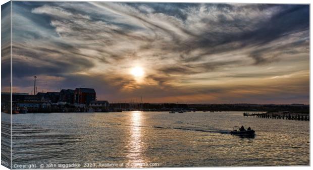 Amble Sunset Canvas Print by John Biggadike