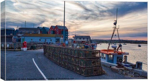 Amble sunset Canvas Print by John Biggadike