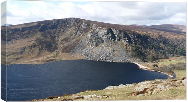 Guiness Lake in County Wicklow. Ireland Canvas Print by John Biggadike