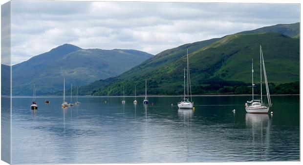 Yachts at rest Canvas Print by John Biggadike