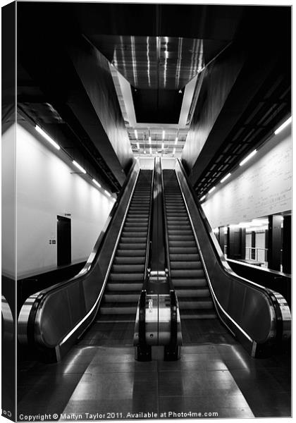 Escalator in Black and White Canvas Print by Martyn Taylor