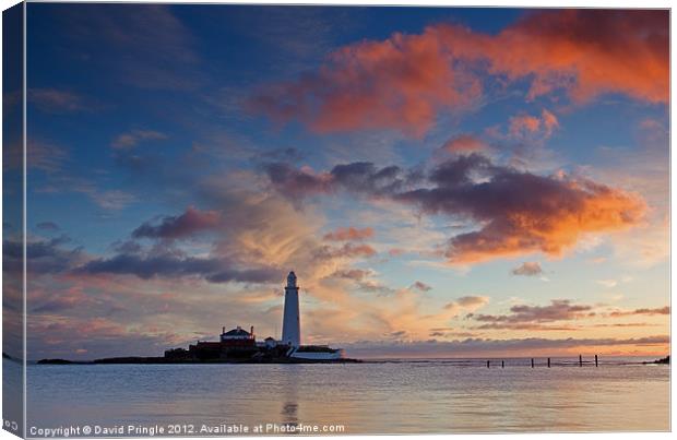 Lighthouse At Sunrise Canvas Print by David Pringle