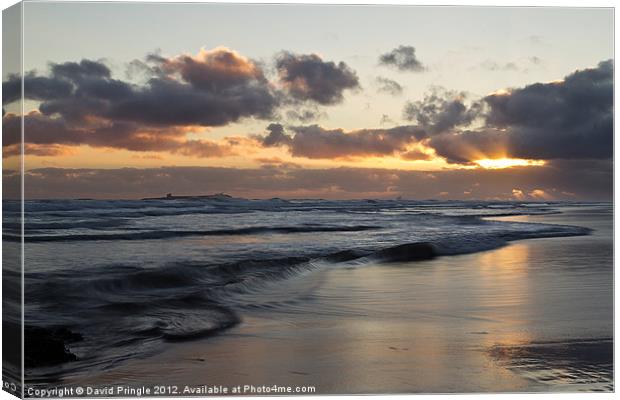 Sunrise at Bamburgh Beach Canvas Print by David Pringle