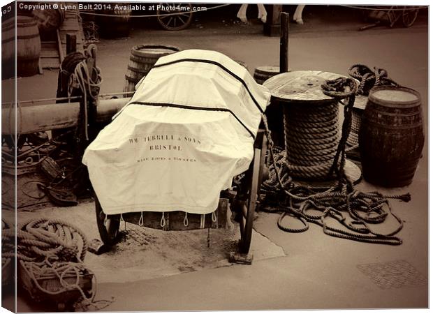 Rope Barrels and Wagon Canvas Print by Lynn Bolt