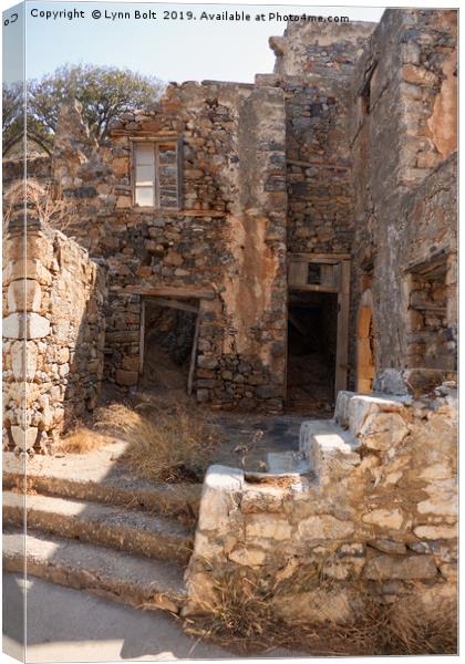 Ruins on Spinalonga Canvas Print by Lynn Bolt