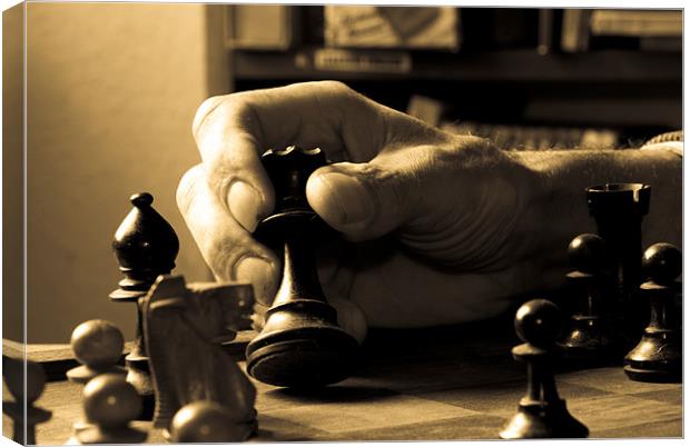 Old hand chess playing Canvas Print by Nathan Wright