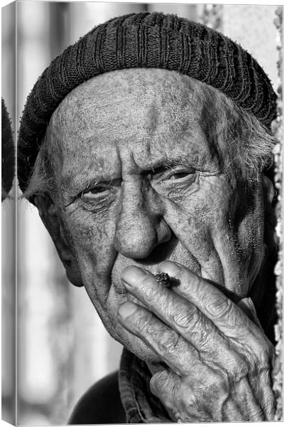 Man having a cigarette Canvas Print by Rory Trappe
