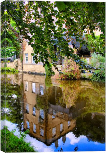 Reflections on the canal. Canvas Print by Irene Burdell