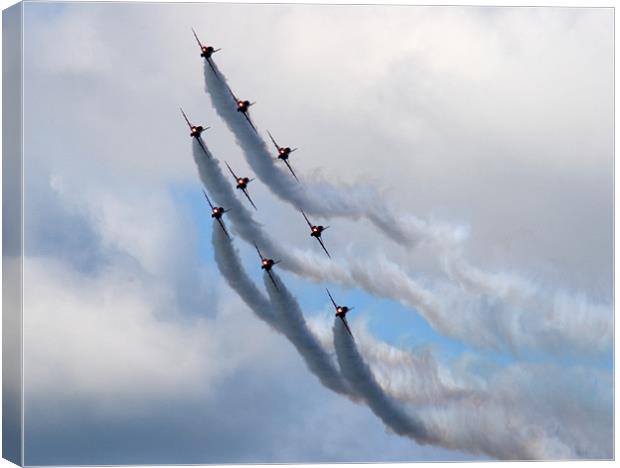 Red arrows in formation Canvas Print by Richie Miles