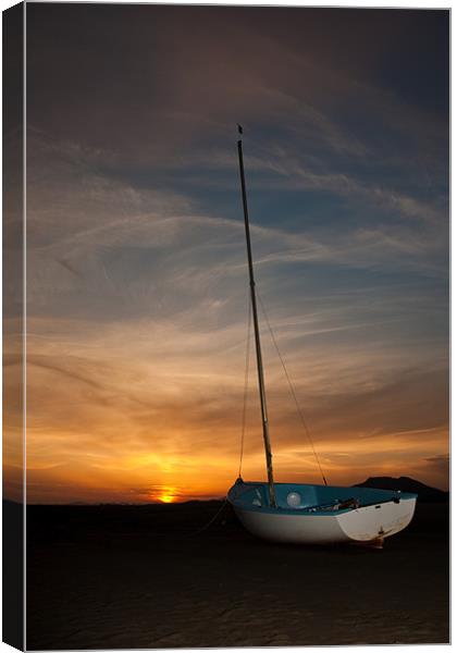 Ynys Sunset and Boat Canvas Print by Helen McAteer