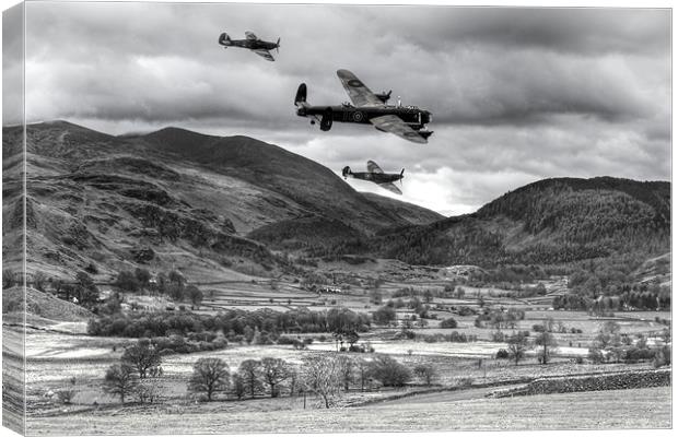 Lancaster bomber and wingmen. Canvas Print by Kevin Tate