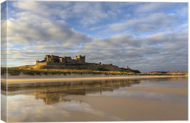 Bamburgh Castle Reflection Canvas Print by Kevin Tate
