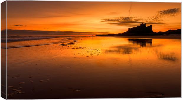 Sunrise at Bamburgh Beach Canvas Print by Kevin Tate