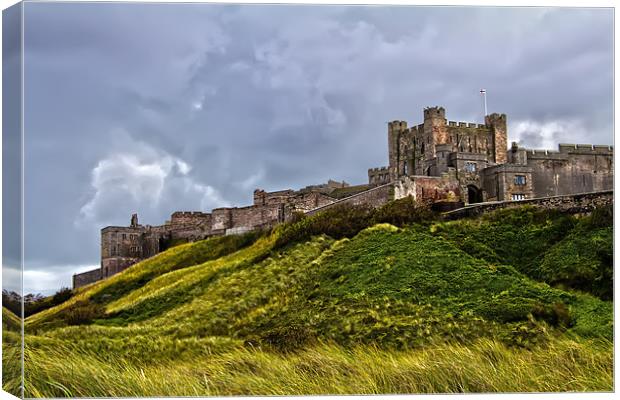 Bamburgh Castle Stormy Skies Canvas Print by Northeast Images