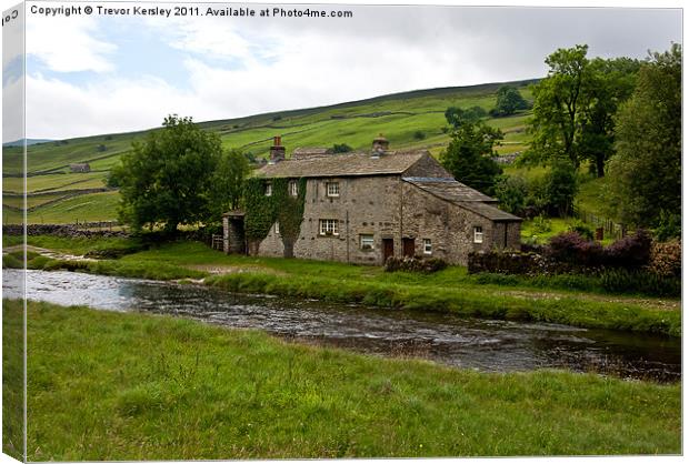 River Cottage - River Wharfe Canvas Print by Trevor Kersley RIP
