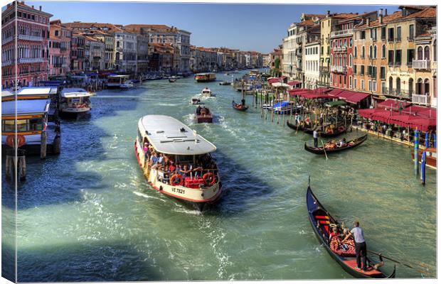 Traffic on the Grand Canal Canvas Print by Tom Gomez