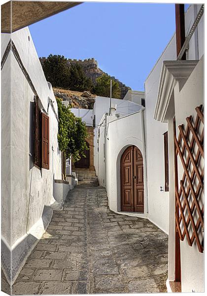 Residental Street in Lindos Canvas Print by Tom Gomez