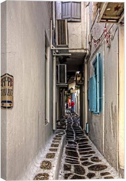 Narrow Lane in Mykonos Canvas Print by Tom Gomez