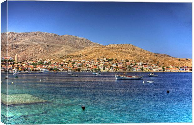 Over Nimborio Bay Canvas Print by Tom Gomez