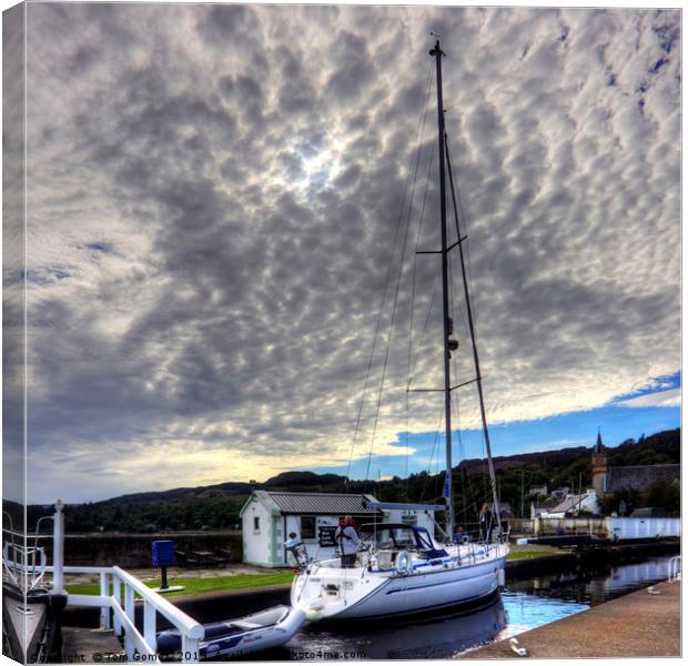 Yacht under a Dappled Sky Canvas Print by Tom Gomez