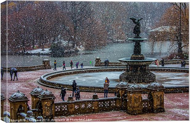 Snow falls on Bethesda Terrace Canvas Print by Chris Lord